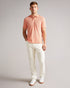 DELVIN-Tops-Dive into DELVIN. This essential polo shirt covers all the bases with a flattering fit, collar, and short sleeves. Paired with jeans and trainers, this top is perfect for spontaneous visits to the farmer's market or can be dressed up with tailored trousers and boots for a smart-casual look. By choosing Ted Baker cotton products, you're supporting our investment in the Better Cotton Initiative's mission. This product is sourced via a system of mass balance and therefore may not contain better cot